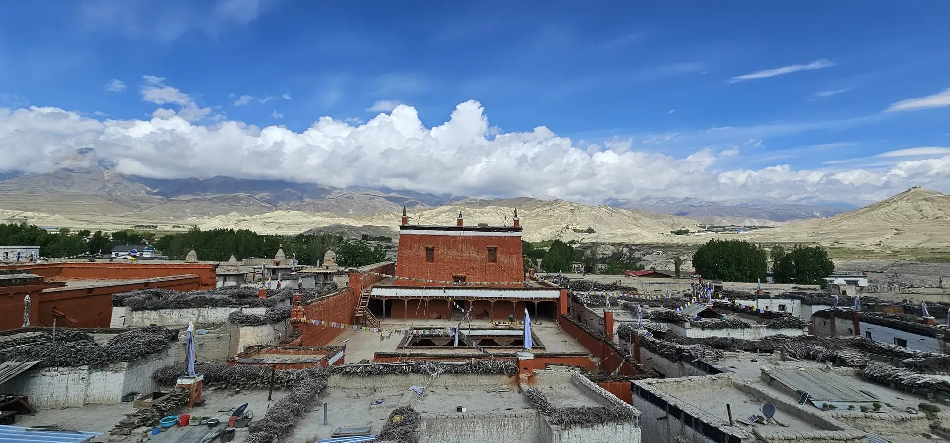 Rooftops of a walled Mustang settlement seen from above