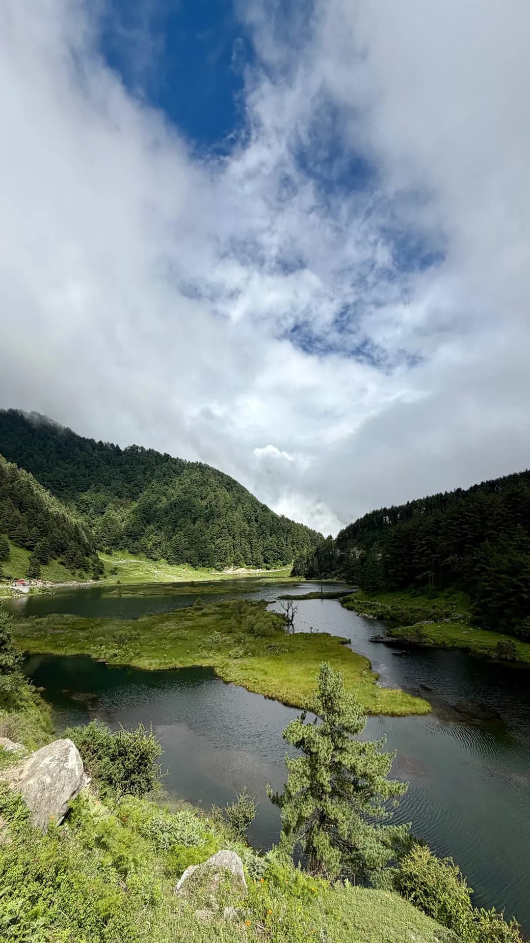 Glacial lake below the ridgeline on the valley trail