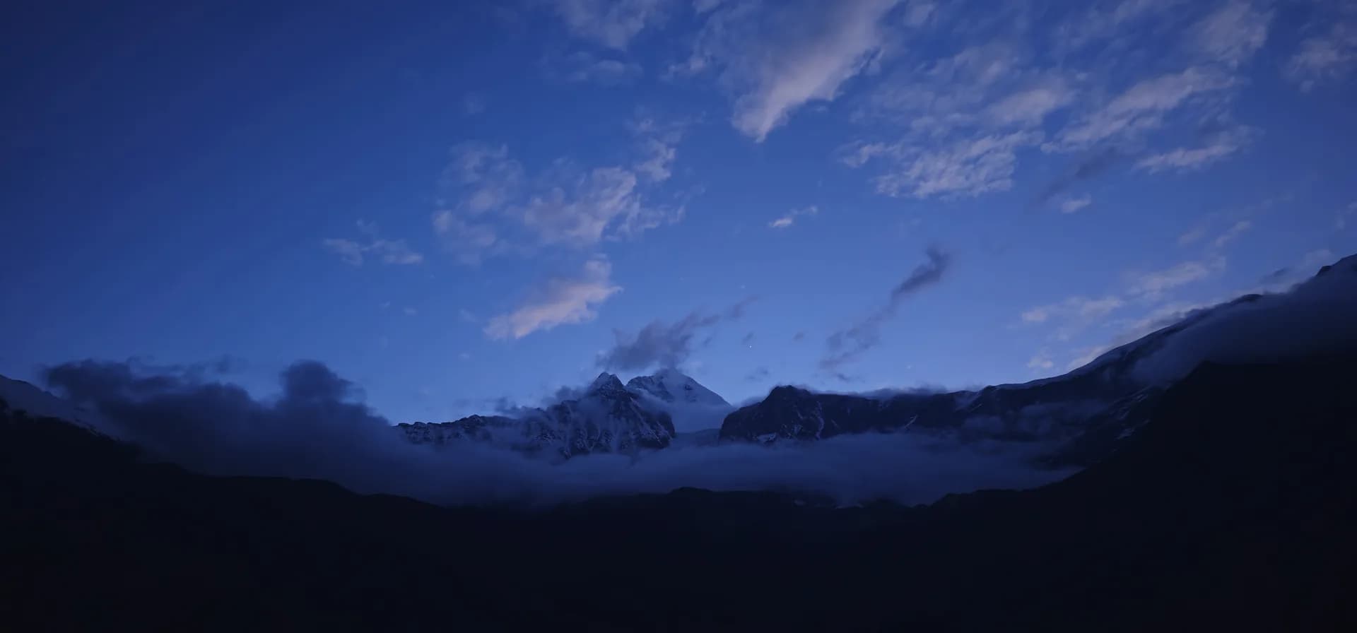Himalayan range at dusk above the valley